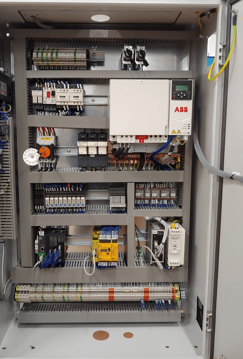 Panel with inverter, PLC and safety configurator